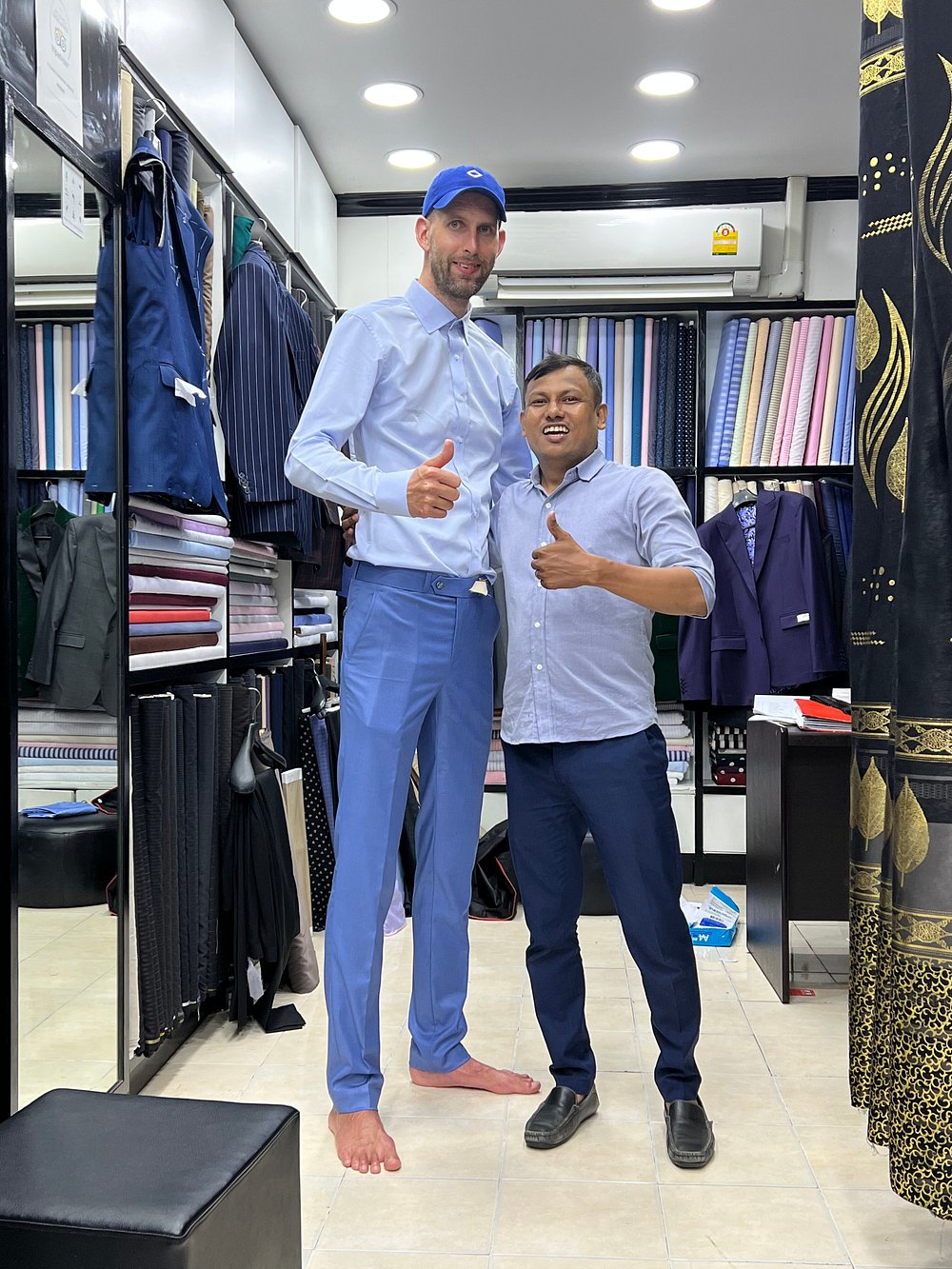 Sanjay with a happy client in the Milano Fashion House showroom